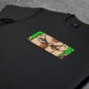 Crna majica sa vezom inspirisana One Piece anime serijalom, sa motivom Roronoa Zoro
